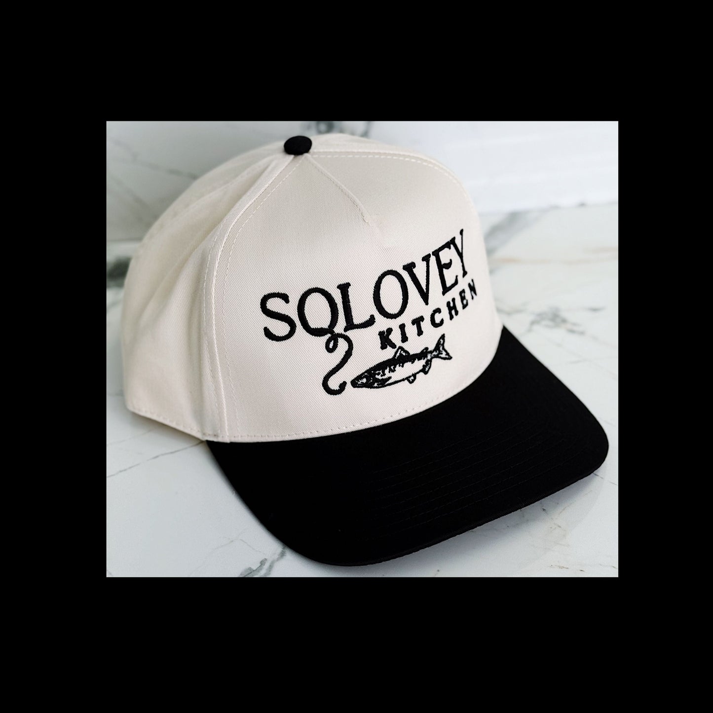Solovey Kitchen Black and Cream Hat