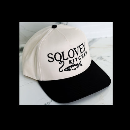 Solovey Kitchen Black and Cream Hat